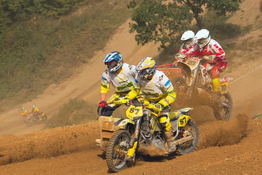 MOHELNICE, CZECH REPUBLIC - SEPTEMBER 17. Unidentified racers rides a sidecar in the "Sidecarcross Championship of Czech Republic"" on September 17, 2011 in the town of Mohelnice, Czech Republic."