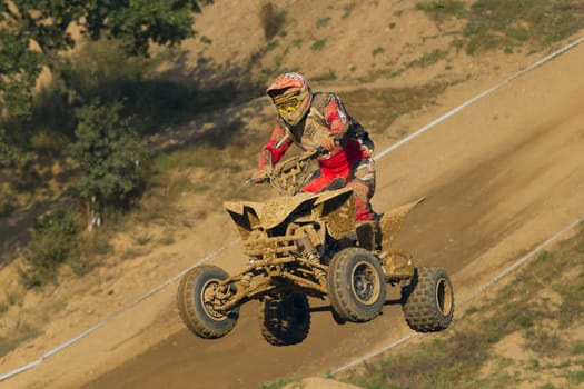 MOHELNICE, CZECH REPUBLIC - SEPTEMBER 17. Unidentified racer jump with a quad motorbike in the "Czech Republic Cup 2011"" on September 17, 2011 in the town of Mohelnice, Czech Republic."