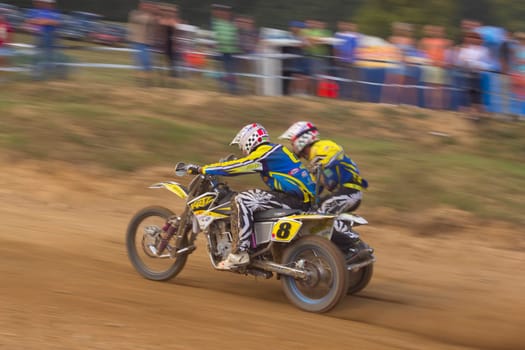 MOHELNICE, CZECH REPUBLIC - SEPTEMBER 17. Unidentified racers rides a sidecar in the "Sidecarcross Championship of Czech Republic"" on September 17, 2011 in the town of Mohelnice, Czech Republic."