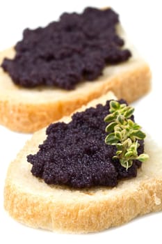 caviar canape on white background