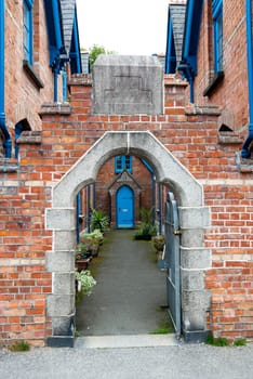 brick house and blue windows in Padstow in Cornwall