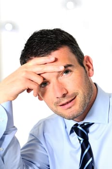 stressed overbooked and tired caucasian businessman