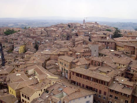 The Medieval cityscape of Siena, Italy located in Tuscany.