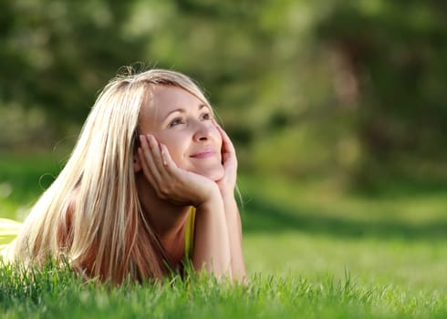 woman relaxing at the park