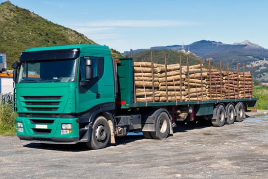 Truck transporting logs, logging truck