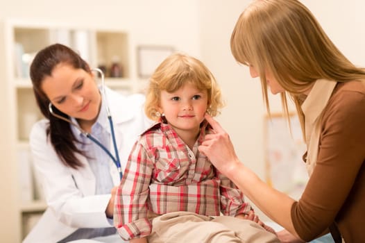 Little girl being examine with stethoscope by pediatrician mother assistance