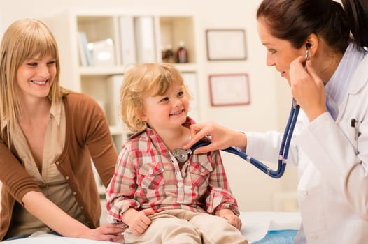 Little girl being examine with stethoscope by pediatrician