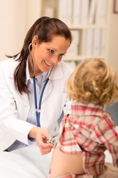 Little girl being examine with stethoscope by pediatrician