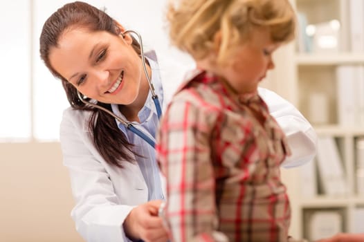 Little girl being examine with stethoscope by pediatrician