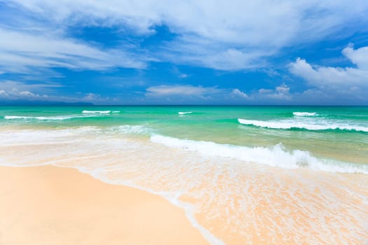 Beautiful sandy tropical beach in sunny day