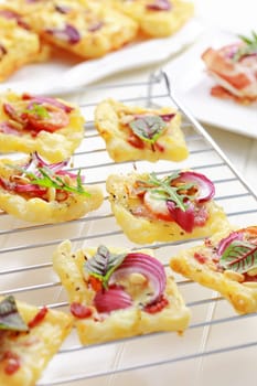 Puff pastry with cheese, tomato and vegetables