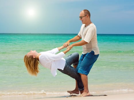 Young couple on the tropical beach