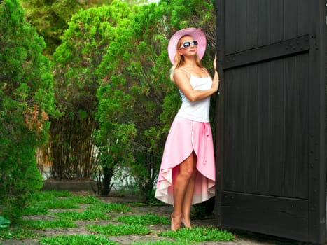 Young beautiful woman waiting for somebody. Retro style
