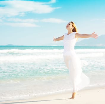 Young woman enjoy sun near ocean