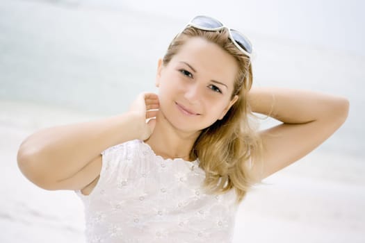 Portrait of young woman on blur natural background