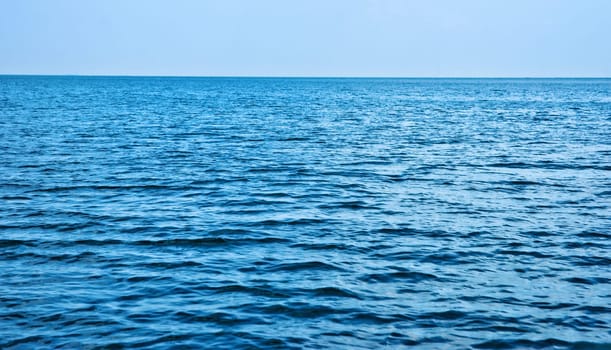photo of beautiful deep calm blue sea water
