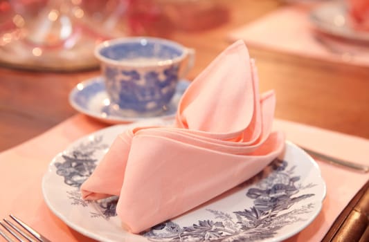 place setting for dinner party with asian crockery