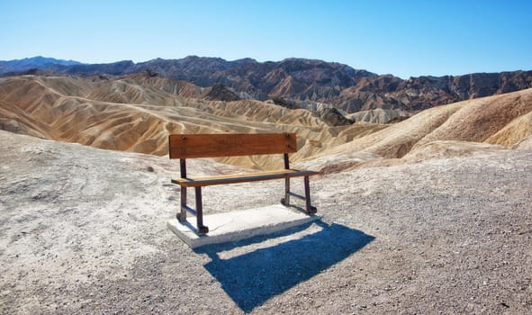 seat at zabrinski point overlooking death valley