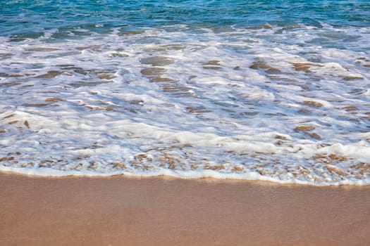 perfect soft waves on the sand at bondi beach