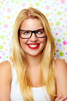 Funny woman with glasses laughing