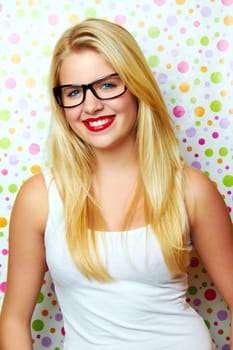 Funny woman with glasses laughing