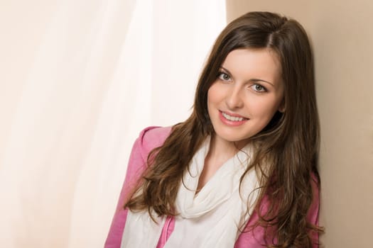Young woman smiling brunette wear pink top
