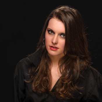 Young woman in black shirt fashion portrait brunette model