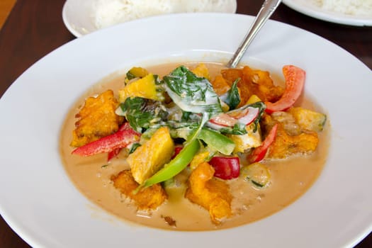 Thai Fired Salmon Fish Red Curry with Pumpkin Bell Peppers and Basil Dish