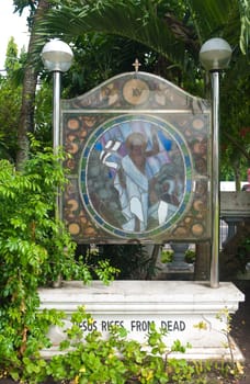 stained glass with religious text in Naga City, Philippines