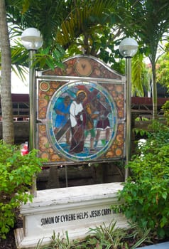 stained glass with religious text in Naga City, Philippines
