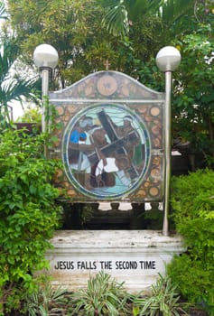 stained glass with religious text in Naga City, Philippines