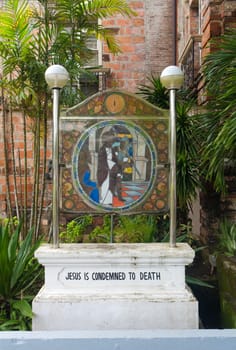 stained glass with religious text in Naga City, Philippines