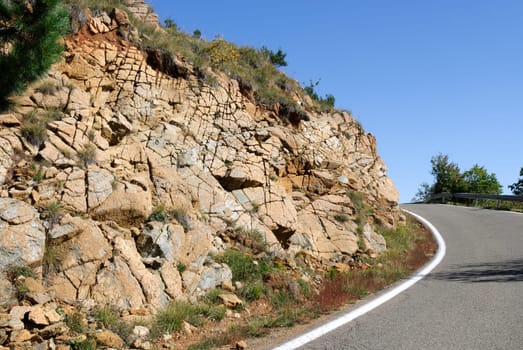curve in a mountain road in Italy