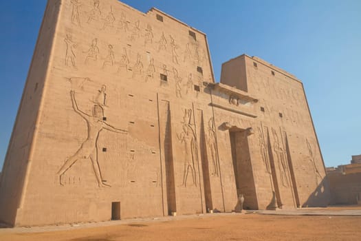 Pylon at Horus Temple with egyptian hieroglyphs ( Edfu, Egypt )