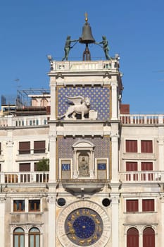 Clock tower in St Mark`s square with zodiac (Venice ,Italy). Vertically.