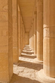 A colonnade of ancient columns at  the Temple of Queen Hatshepsut at Luxor (Egypt )