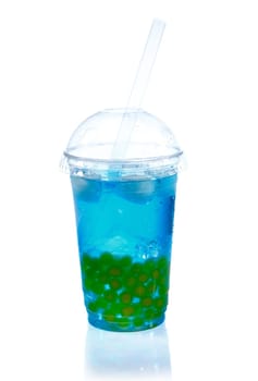 Chinese Bubble tea with blue syrup and mango pearls isolated on white background with reflexion.