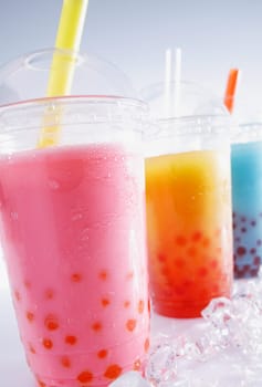 Assorted Bubble Tea Drinks on crushed ice with fruit pearls