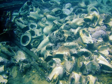 Underwater landscape with w.c. pans fragments. The Red Sea