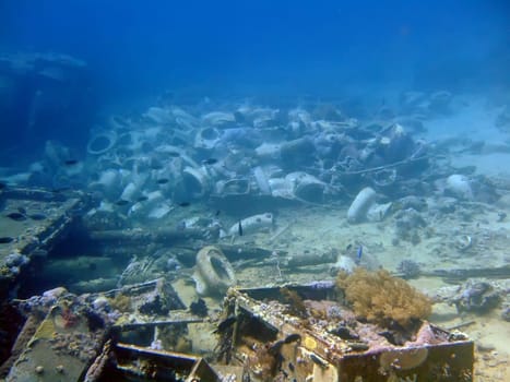 Underwater landscape with w.c. pans fragments. The Red Sea