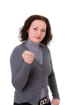 mid adult woman shows the fist  isolated on white background