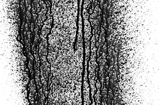 Black paint splashed over white background. Design element.