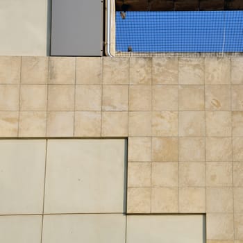Wall and sky architectural background. Modern building facade detail.