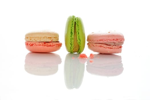 Colorful macaroons on white background