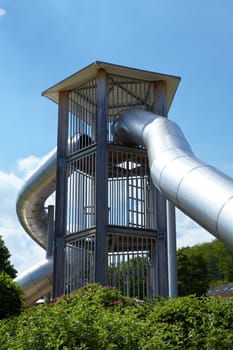 Modern tube slide made of stainless steel