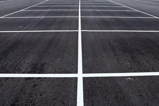 Diagonal view of a large new empty parking area