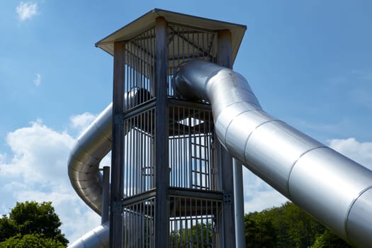 Modern tube slide made of stainless steel