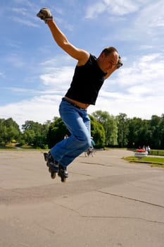 extreme rollerblader in jump