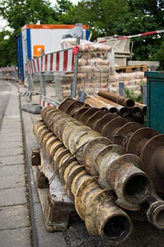 Secured construction site with augers