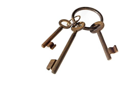 Three old rusty keys on key ring